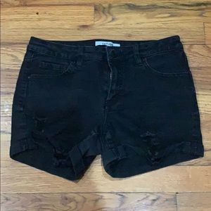 Black ripped shorts